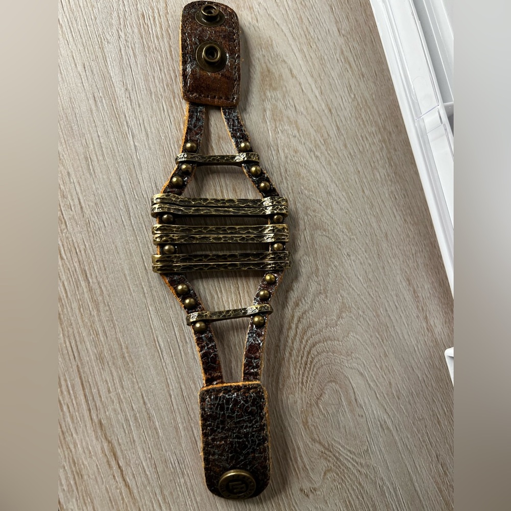 Leather bracelet with metal detailing